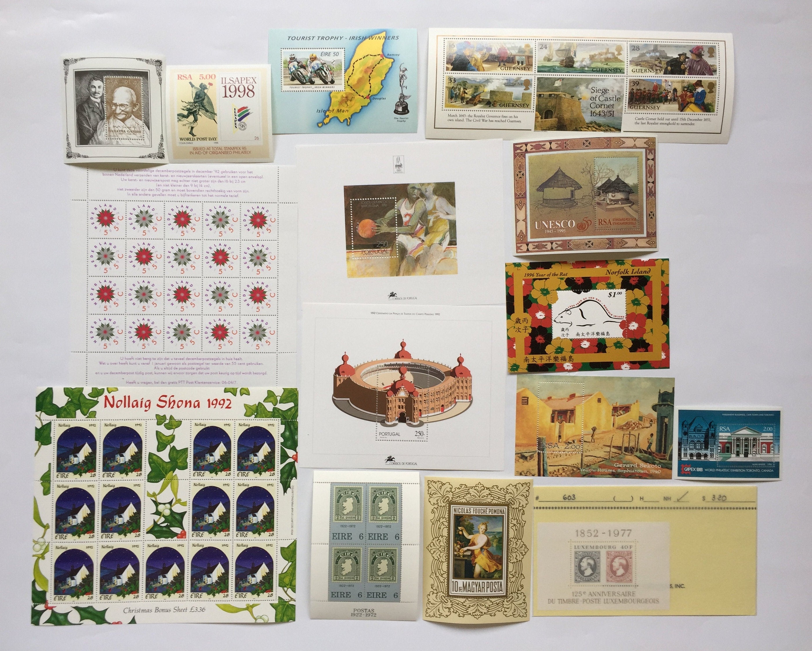 A collection of Worldwide Stamp Souvenir Sheets Etsy