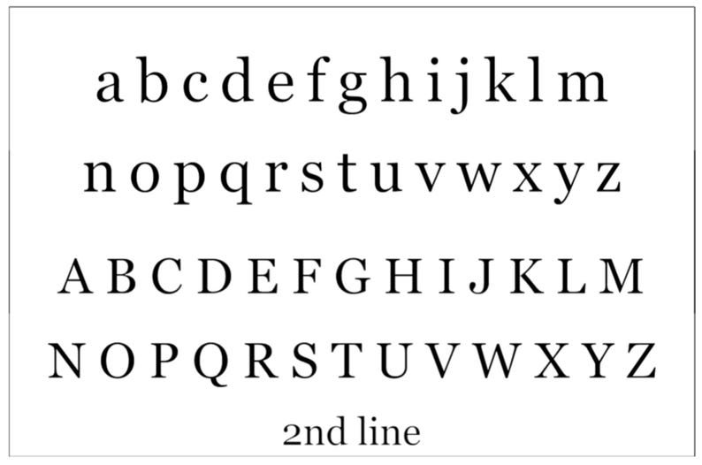 May include: A white background displays black lowercase and uppercase alphabets in a serif font. The letters are arranged in rows, with the text "2nd line" at the bottom.