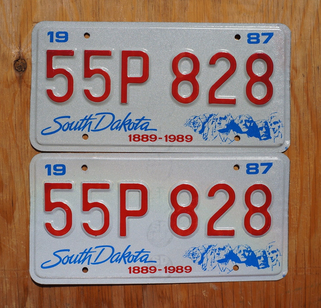 1987 South Dakota Centennial Mt Rushmore License Plate Pair