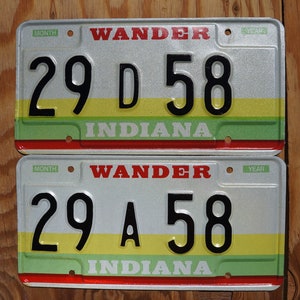 One or More - 1980s INDIANA Vintage License Plate Wander Yellow Green Red Stripes PAIR / SET - Mint Excellent Condition