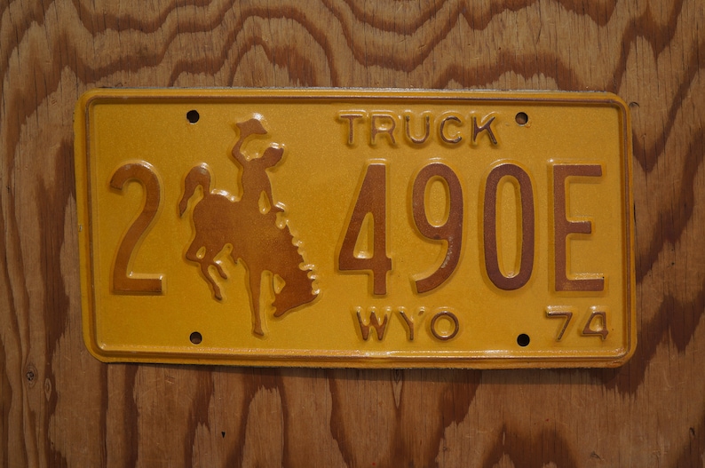 1974 Wyoming Cowboy Horse Yellow License Plate # 2-490E