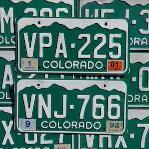 One or More - COLORADO GREEN MOUNTAINS License Plate