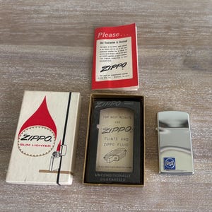 Vintage Zippo Unfired Slim Lighter, USS, With Original Box and Instruction Booklet, circa 1966