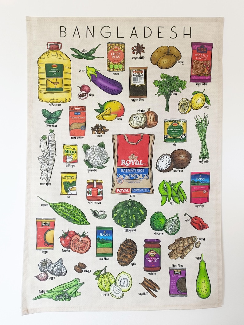 May include: A beige tea towel featuring a colorful illustration of various foods and spices, with the word "BANGLADESH" at the top. The design includes images of vegetables, fruits, and packaged goods, with text labels in both English and Bengali.