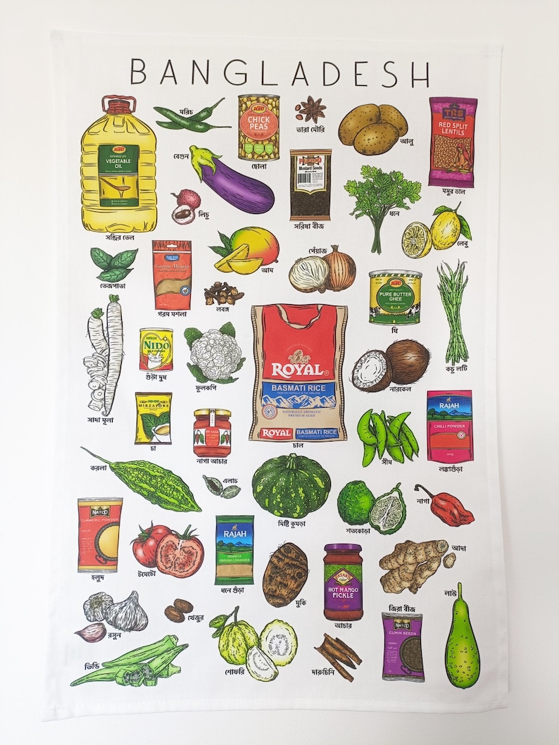 May include: White Bangladesh-themed kitchen towel featuring illustrations of various foods and spices, including vegetables, fruits, and packaged goods. The word "BANGLADESH" is printed at the top in black capital letters.