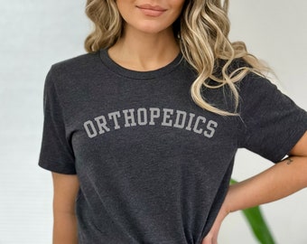 Orthopedics, Surgeon, Physician, Sports medicine Unisex Jersey Short Sleeve Tee