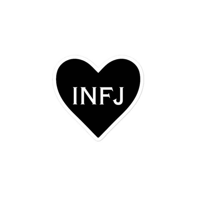 May include: Black heart-shaped sticker with the text "INFJ" in white.