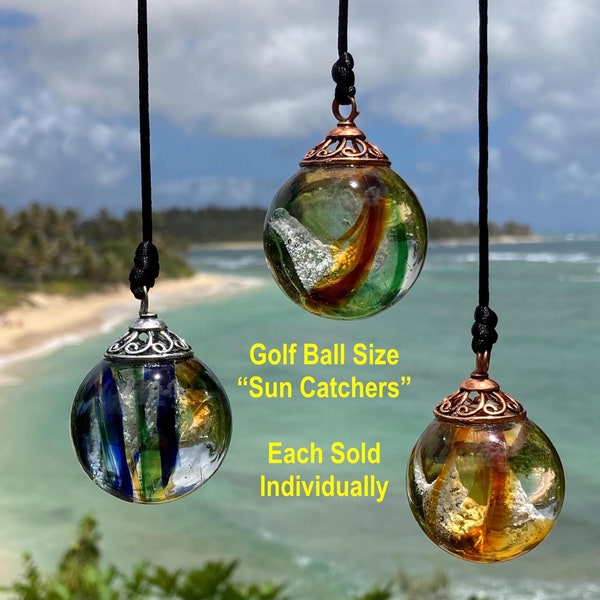 Cremated ashes in glass Sun Catcher (Colors: Peacock/Earth Tones/Gold) Lifetime ashes to ashes glass keepsake. Also, cremains in pendants.