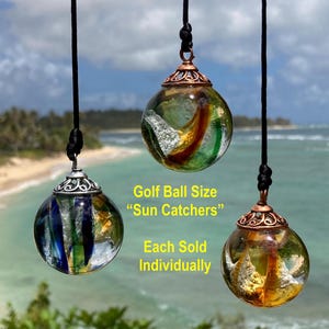 Cremated ashes in glass Sun Catcher (Peacock/Earth Tones/Gold). Lifetime ashes to ashes glass keepsake. Cremains in pendants w/without opals