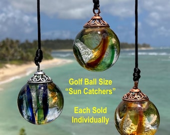 Cremated ashes in glass Sun Catcher (Peacock/Earth Tones/Gold). Lifetime ashes to ashes glass keepsake. Cremains in pendants w/without opals
