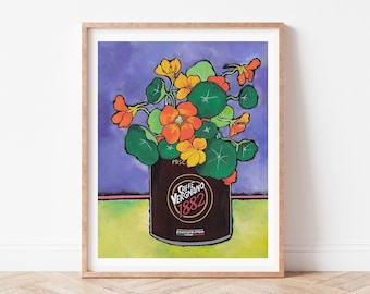 May include: A painting of a still life featuring a can of caffe Vergnano 1882 coffee with a bouquet of orange and yellow flowers in a purple, green, and yellow background.