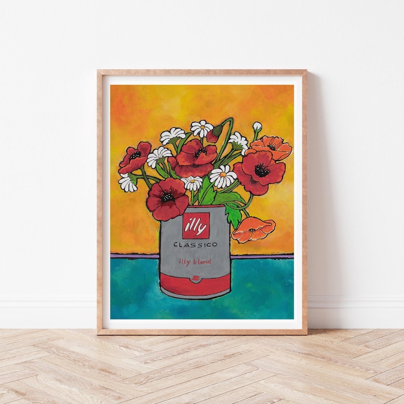 Colorful Italian pop art still life featuring an Illy coffee can with poppies and daisies in it. The background is orange and yellow on top and teal on the bottom.