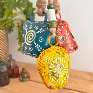 Set of Three Rustic Cow Bells with Hand Painted Finish, Hanging Bells with Jute Twine Hanger, Boho Hippie Rustic Hanging Bells Wind Chimes