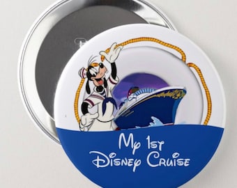May include: A round button with a blue and white design. The button features a cartoon image of Goofy in a sailor outfit, a cruise ship, and the text "My 1st Disney Cruise". The button is approximately 2.5 inches in diameter.