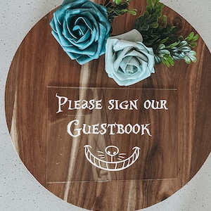 Alice in wonderland please sign our guestbook | Alice in wonderland wedding | Disney wedding | tea party | Disney wedding decor | bridal