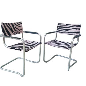 2 - Bauhaus-style Chair with chrome tubular frame and zebra-print cowhide upholstery, by Mart Stam and Marcel Breuer, 1970s.Pink zebra