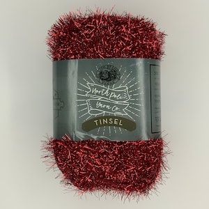 red tinsel yarn