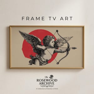 Op de afbeelding: Ingelijste kunstdruk met een vintage illustratie van Cupido met pijl en boog, tegen een rode cirkel en een beige achtergrond. De tekst "FRAME TV ART" staat bovenaan. Het Rosewood Archive-logo staat onderaan.