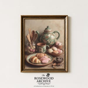 May include: A framed print featuring a still life of baked goods and tea service. The image includes a green teapot, a mug, and a plate of pastries. A jar of wooden spoons and a bowl of cookies are also present. The text "The Rosewood Archive" is at the bottom.