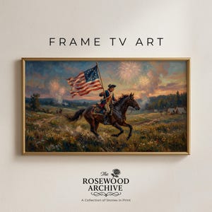 May include: A framed painting depicts a historical scene of a person on horseback holding a flag with stars and stripes. Fireworks burst in the sky above a field with tents. The text "FRAME TV ART" is at the top.