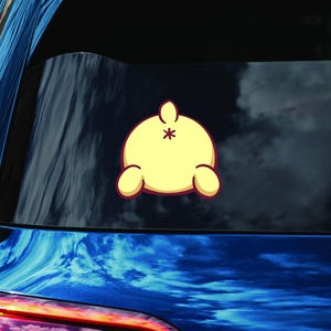May include: A yellow cartoon character with a red outline, viewed from behind, with a tail and two small arms. The character is facing away from the viewer.