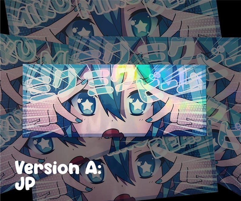 May include: A holographic sticker featuring an anime-style character with blue hair and star-shaped eyes. The character's hands frame their face, with Japanese text above. The sticker has a vibrant color scheme of blues, pinks, and reds.