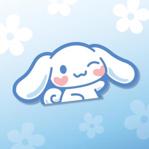 May include: A cartoon illustration of a white, bunny-like character with large ears and a blue outline. The character has pink cheeks and a smiling expression. The background is light blue with white flower accents.