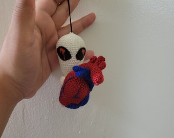 Alien with specimen keychain, Purple Alien with Dumbo octopus, forest green alien with mushroom, white alien with anatomical heart, keychain