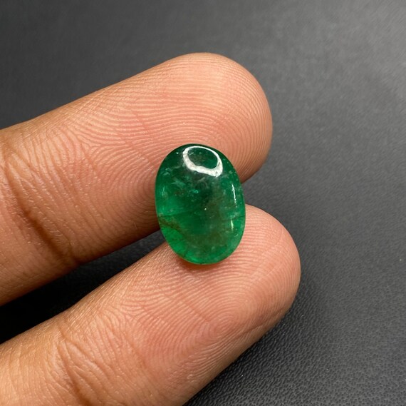 Emerald cabochon price per carat sale