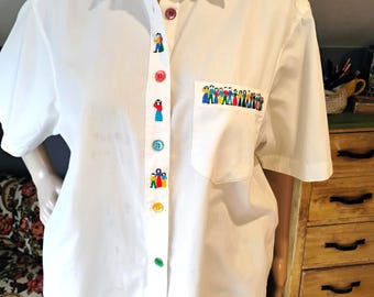 Cute 1990s white cotton blouse. Short sleeve, made in USA. People, rainbow buttons. Medium