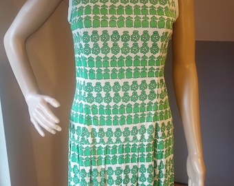 Vintage tennis or pickleball dress with shorts. 1960s,1970s era. sleeveless, green and white, floral. women&#39;s small.