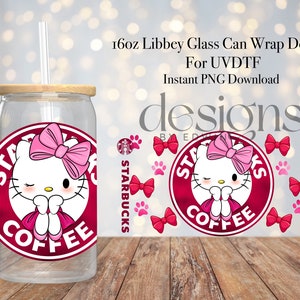 May include: A 16 ounce clear glass can with a pink Hello Kitty design. The can has a red and white Starbucks logo with the words "Starbucks Coffee".