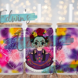 May include: Three stainless steel tumblers with a floral design and a cartoon image of Frida Kahlo. The tumblers have a bamboo lid and a clear straw.