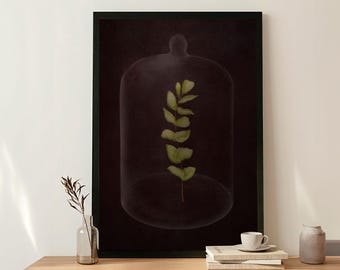 May include: A framed wall art print featuring a dark, moody background with a single green eucalyptus sprig enclosed inside a glass cloche. The artwork is displayed in a thin black frame, showcasing a botanical subject with deep shadows.