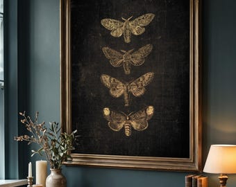 May include: A framed wall art piece featuring four gold-colored moth illustrations arranged vertically on a dark black background. The artwork is enclosed in a rectangular gold frame with a classic profile, showcasing detailed insect wing patterns.