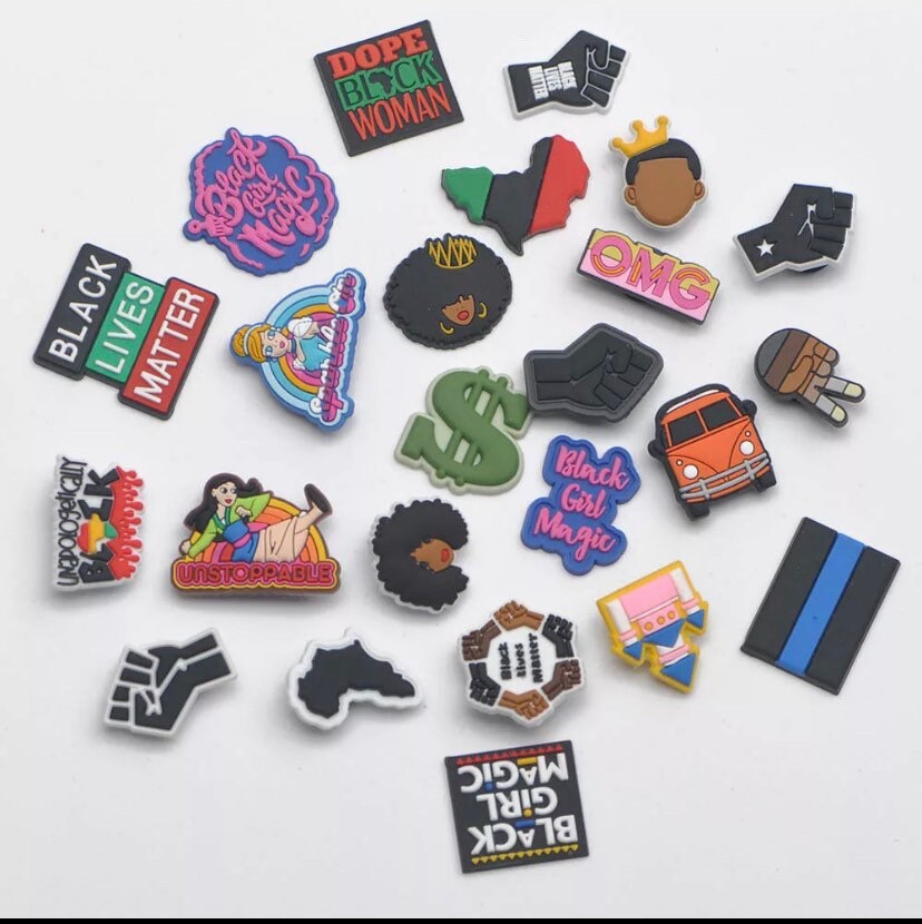 comme des garcons croc charms