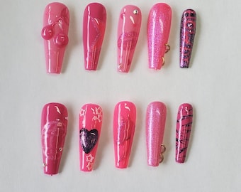 Pink pony club inspired press on nails. Cute pink and sparkly with glow in the dark details