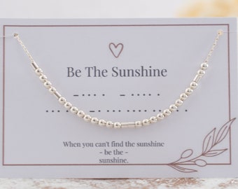 Collar con código Morse "Sé el Sol": Mensaje secreto en plata de ley