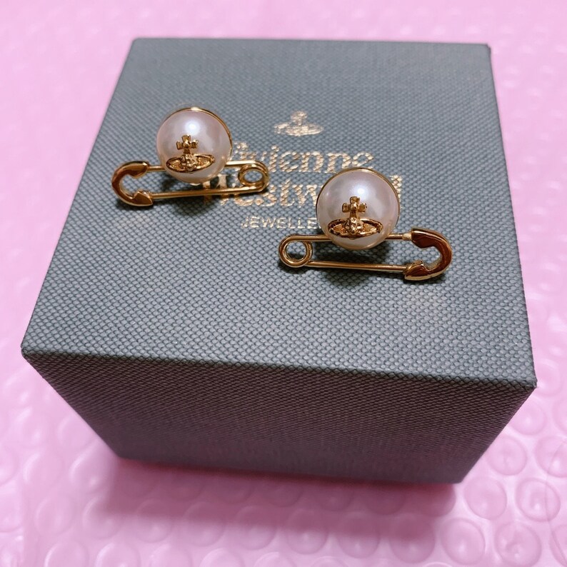 Vivienne Westwood gold pearl safety pin earrings Etsy