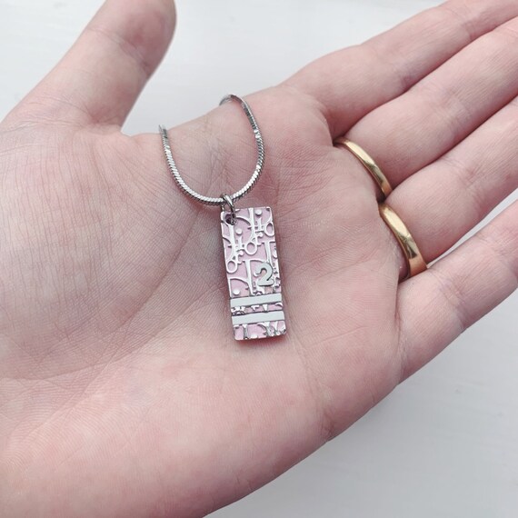 Vintage Dior silver and pink monogram logo trotter