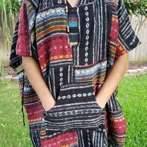 Namaste multicolor rectangular shaped aztec styled handmade beautifully hippie comfy one sized cozy poncho winter unisex cotton pullover.