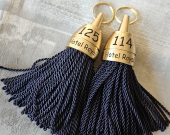 Solid Philadelphia hotel keychain with tassel | Gold-colored keychain for accommodations