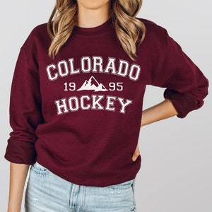 Printify Colorado Avalanche Big Foot Retro 90's NHL Crewneck Sweatshirt L / Carolina Blue