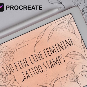 May include: A digital tablet displaying a Procreate app screen with a pink background and the text "100 Fine Line Feminine Tattoo Stamps". The screen shows a variety of delicate line art designs of flowers and leaves.