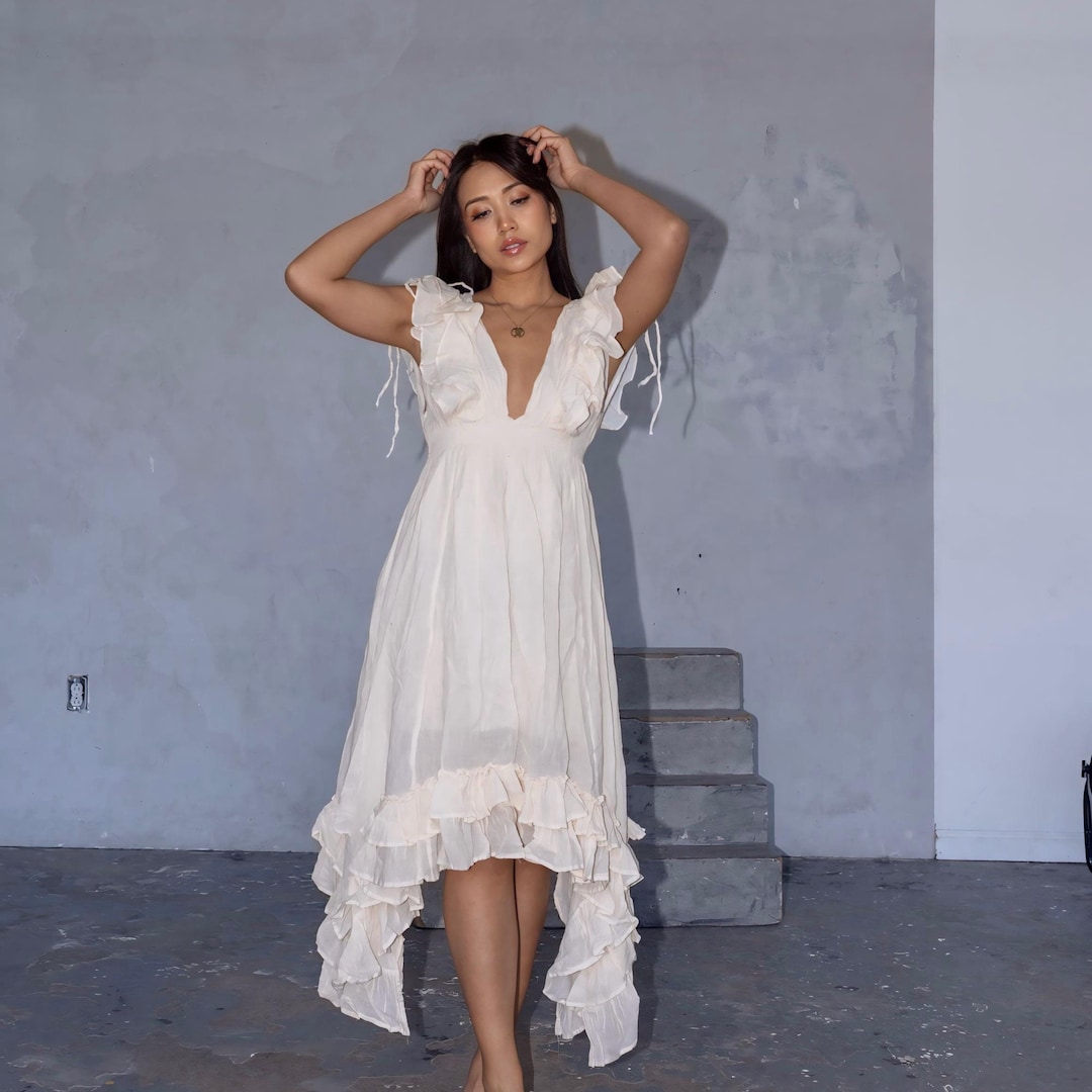 v neck ruffle hem cape large hemline midi dress beige Boho - Deep V-neck, Smocked Waist, Asymmetrical Hem, Romantic Cottagecore Summer Dress simple satin wedding dress Pinkblush Navy Blue Smocked Style:EG01926DN