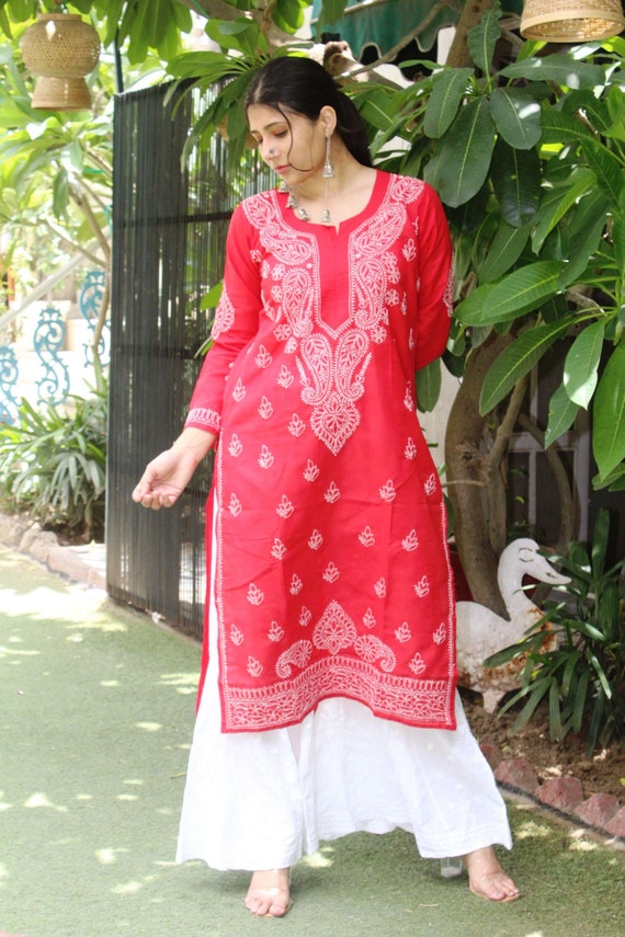 Pure cotton red Kurti is from our festive wear collection This is heavily  flared cotton Kurti with golden screen printing on the borders of the Kurti  On teaming up with good jewelry