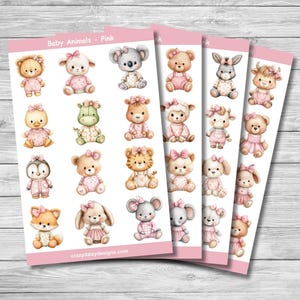 May include: Sheets of pink baby animal stickers. Each sticker features a different animal, including a lion, sheep, koala, bear, bunny, cow, duck, hippo, and more. The stickers are in a watercolour style and have pink bows and outfits. The text "Baby Animals - Pink" is at the top.