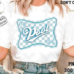 May include: White t-shirt featuring a retro-style design that reads "It's Pool Time" in a blue and white checkered frame. The design has a vintage aesthetic, perfect for summer.