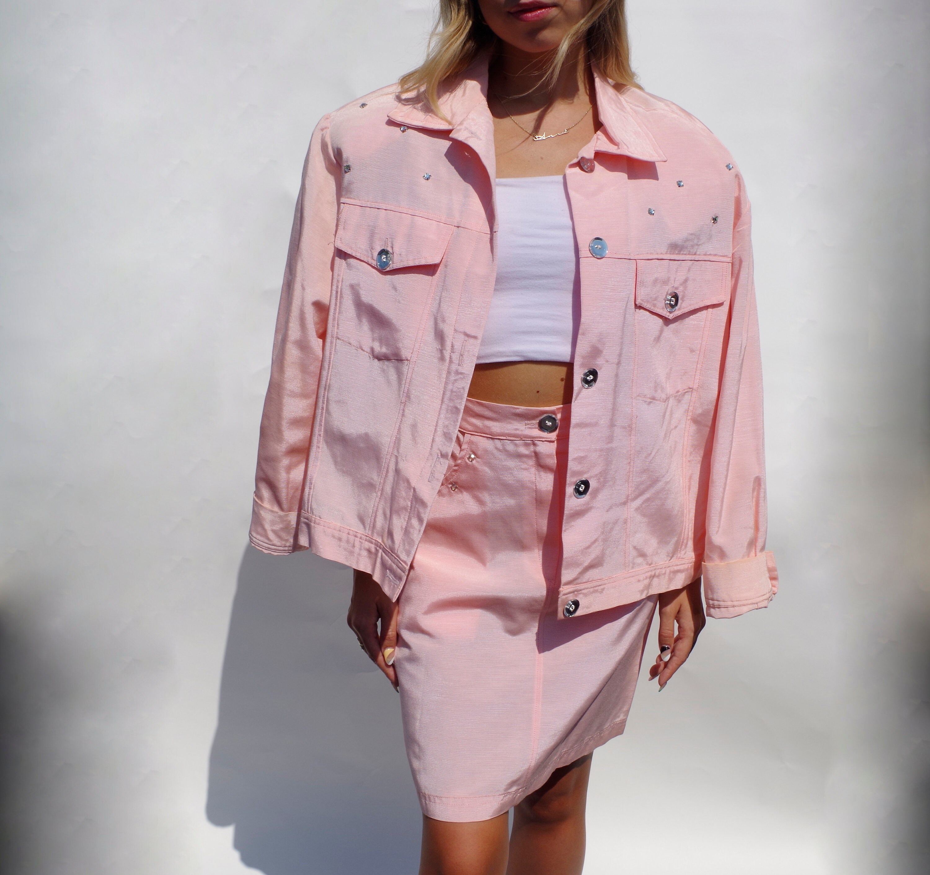 pink jacket and skirt set