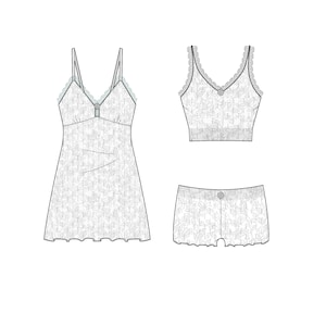Puede incluir: Un conjunto de lencería blanco de tres piezas. El conjunto incluye un camisón corto con tirantes finos y dobladillo festoneado, un top corto a juego y un par de shorts. Todas las piezas presentan un estampado floral y botones decorativos.